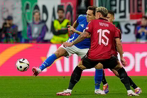 Federico Chiesa and Albania's Taulant Seferi